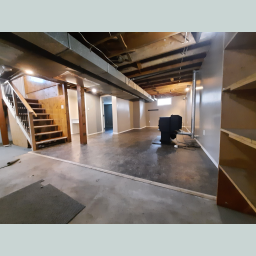 Partially finished basement - rec room + pellet stove